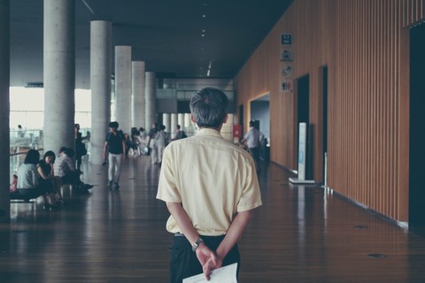 view of person from behind in a classroom